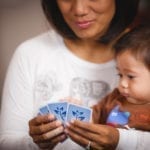 Baby Playing Rook with 57 Cards