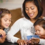 Family playing Rook together