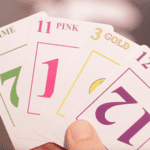 57 cards candy colored holding